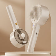 White handheld cleaning brush with bristle head on a gray background